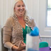 faculty member smiling